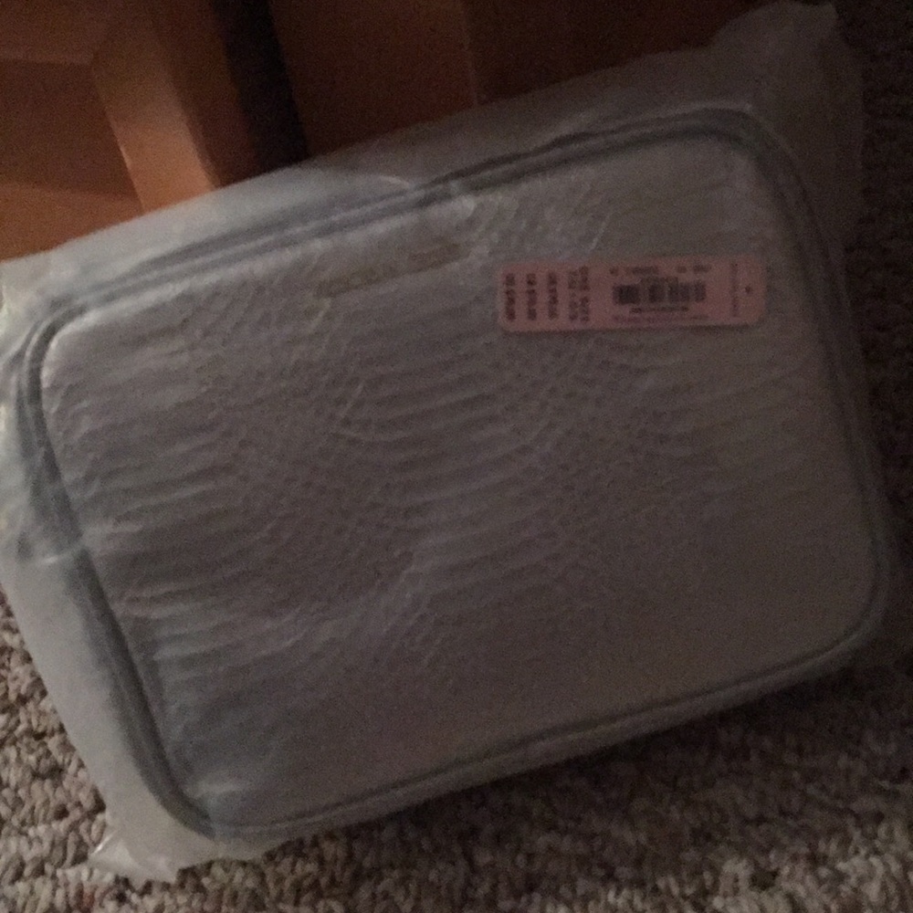 Silver still wrapped pocketbook